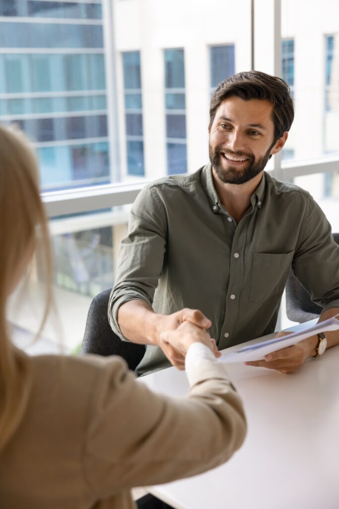 Shaking hands with the new hire!